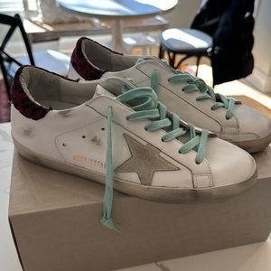 Golden Goose Superstar Classic Sneaker in White, Ice, & Fuchsia, Black, & Leo.